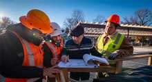 Architect Thad Heckman going over plan details